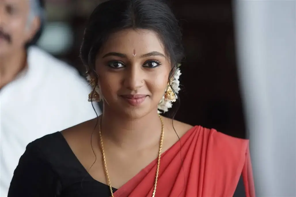 TAMIL GIRL LAKSHMI MENON IN RED LEHENGA VONI